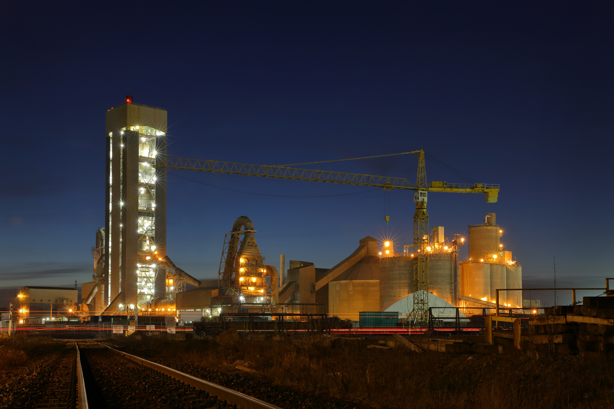 A concrete plant in the early morning twilight.